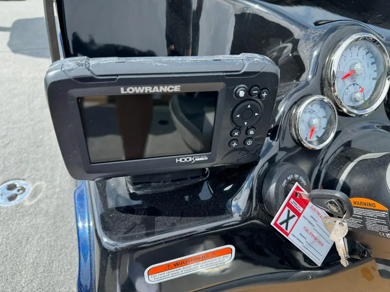 Slide: The Image of Lowrance Hook2 fish finder on 2024 Nitro ZV19 Sport boat dashboard. - 6