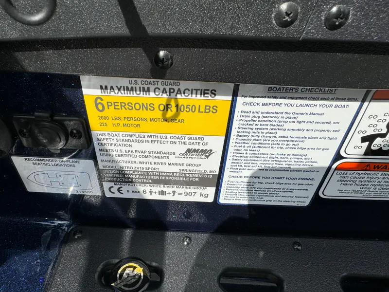 Slide: The Image of 2024 Nitro ZV19 Sport boat capacity label, 6 persons or 1050 lbs, safety guidelines. - 7