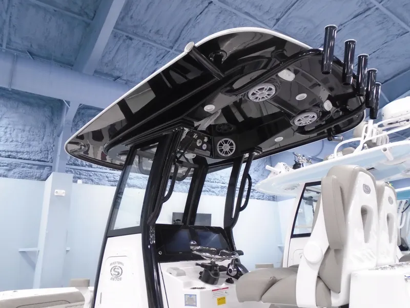 Slide: The Image of 2024 Sportsman 267OE boat interior with advanced console and seating. - 3
