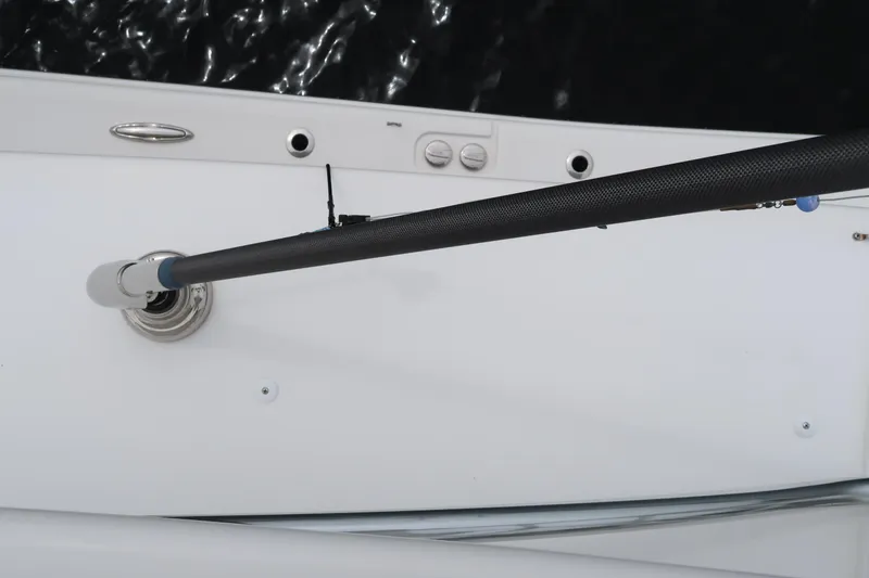 Slide: The Image of Top view of a 2016 Invincible 42 Open Fisherman boat's deck and fishing rod holder. - 11