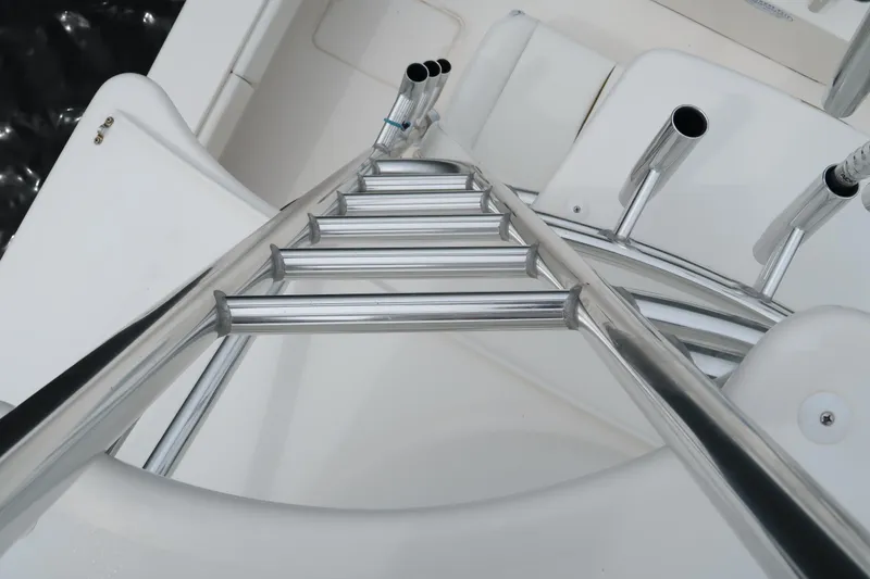 Slide: The Image of Ladder and rod holders on 2016 Invincible 42 Open Fisherman boat. - 13
