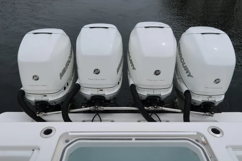 Slide: The Image of Four Mercury outboard engines on a 2016 Invincible 42 Open Fisherman boat. - 17