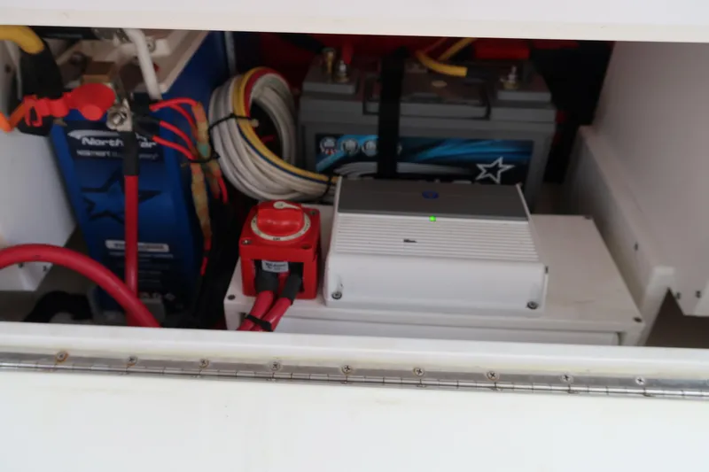 Slide: The Image of Battery compartment of a 2016 Invincible 42 Open Fisherman boat. - 18