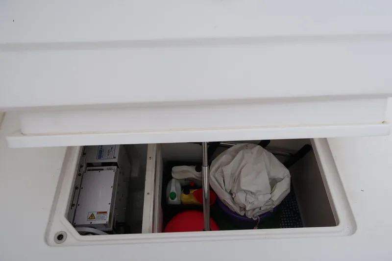 Slide: The Image of Storage compartment of a 2016 Invincible 42 Open Fisherman boat. - 24