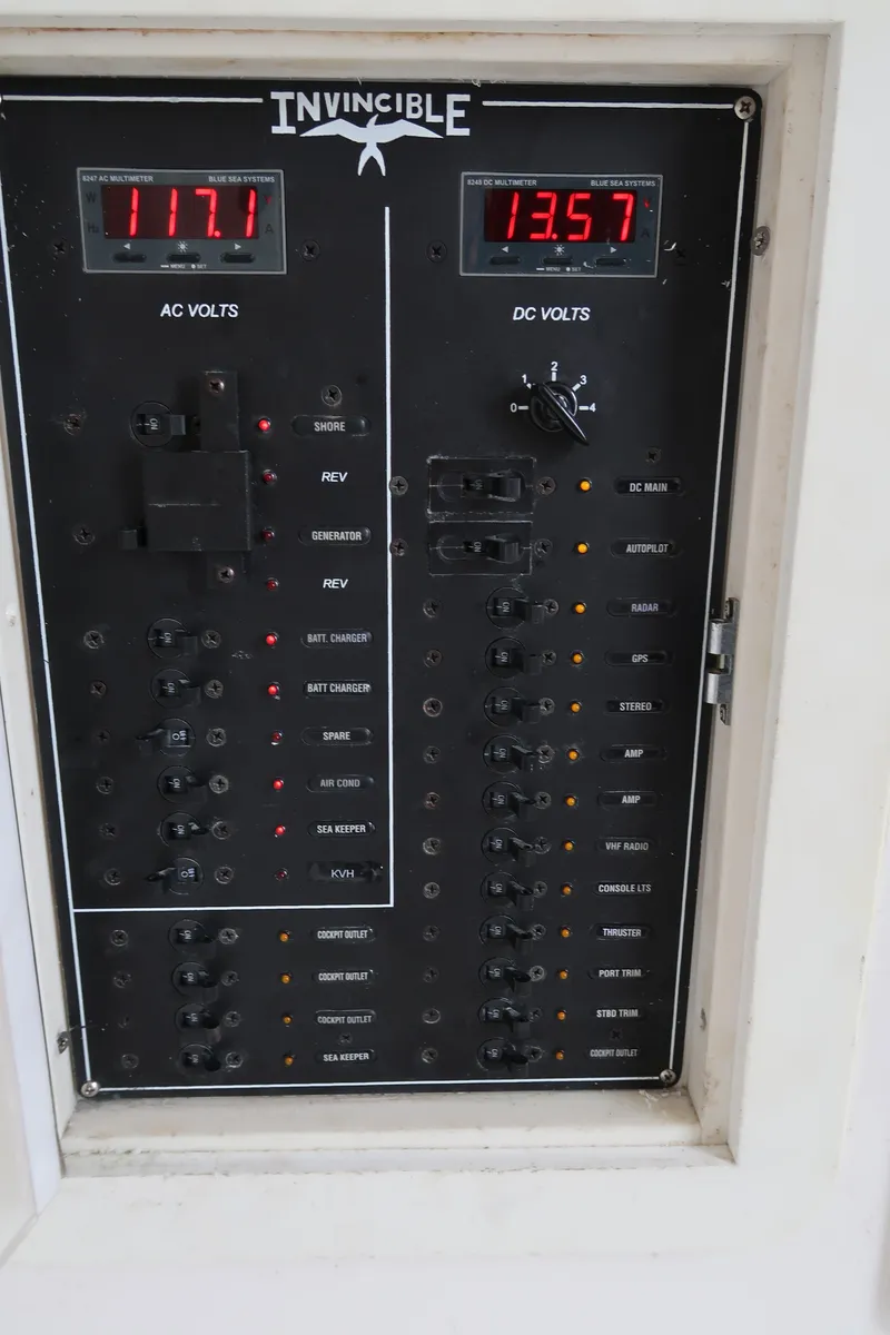 Slide: The Image of Electrical control panel of a 2016 Invincible 42 Open Fisherman boat. - 31