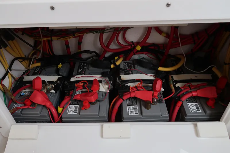 Slide: The Image of Battery compartment of 2016 Invincible 42 Open Fisherman boat with wiring. - 35
