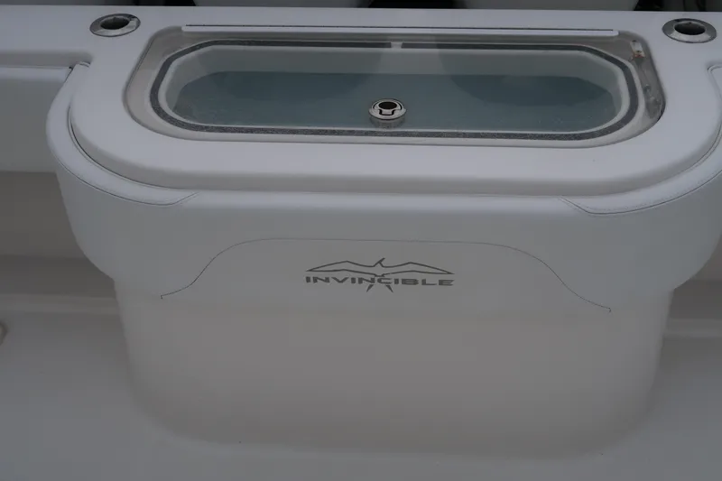 Slide: The Image of 2016 Invincible 42 Open Fisherman livewell compartment. - 37