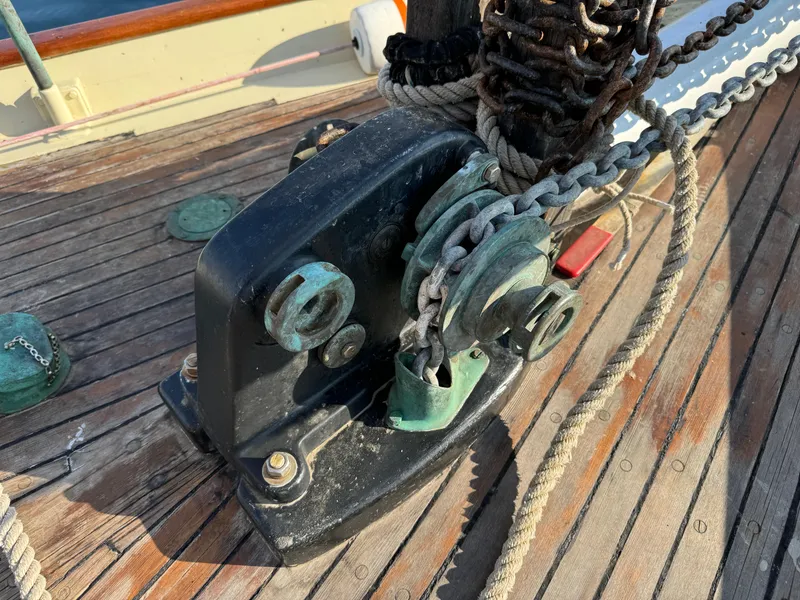 Slide: The Image of Anchor windlass on 1996 Custom John Alden Malabar II sailboat deck. - 13
