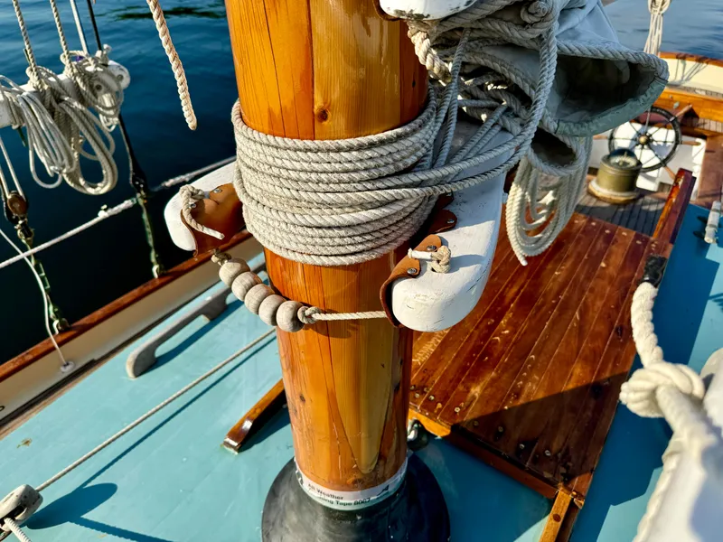 Slide: The Image of Wooden sailboat deck with ropes and mast, Custom John Alden Malabar II, 1996 model. - 25