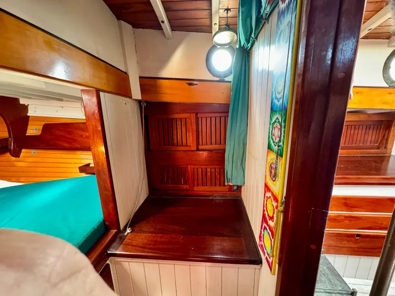 Slide: The Image of Cozy wooden cabin interior of 1996 Custom John Alden Malabar II sailboat. - 34