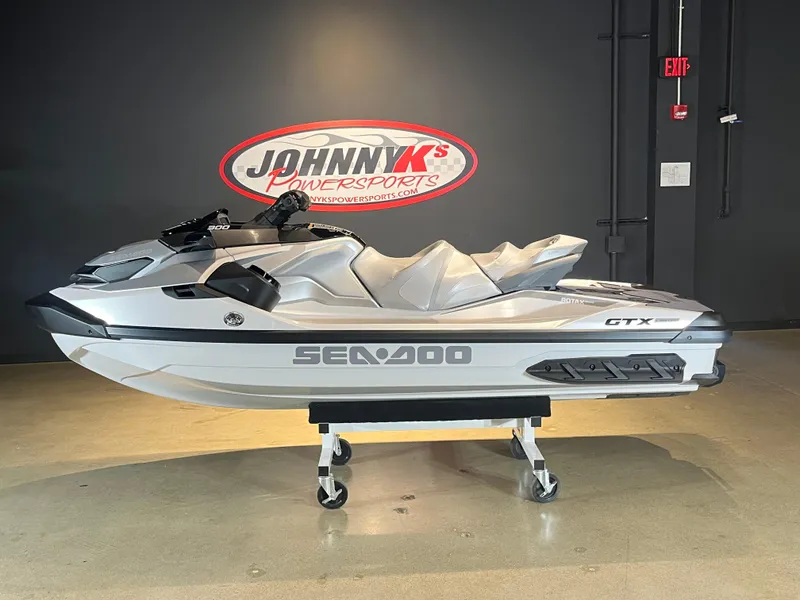 Slide: The Image of 2024 Sea-Doo GTX Limited 300 jet ski at Johnny K's Powersports showroom. - 0