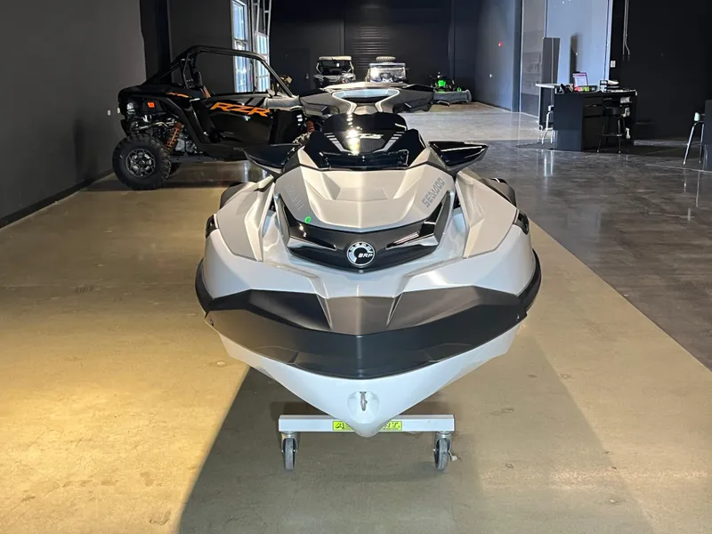 Slide: The Image of 2024 Sea-Doo GTX Limited 300 jet ski in a showroom. - 4