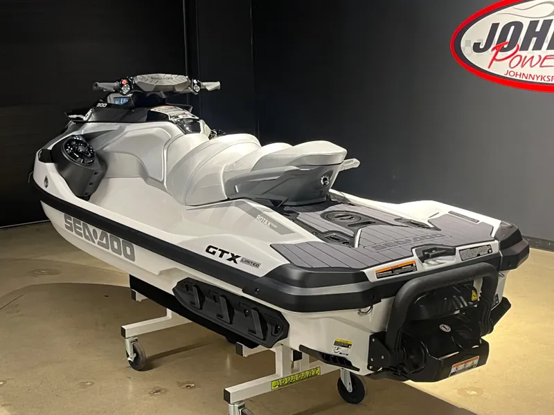 Slide: The Image of 2024 Sea-Doo GTX Limited 300 jet ski in showroom. - 6