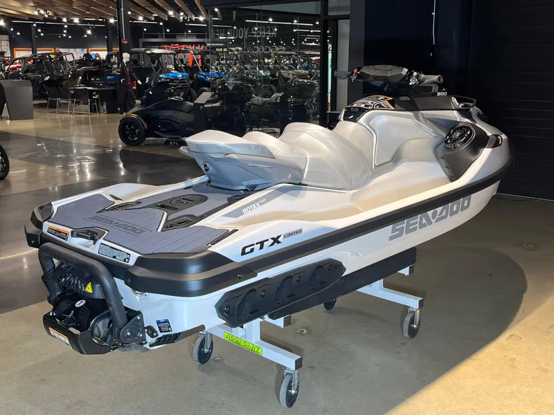 Slide: The Image of 2024 Sea-Doo GTX Limited 300 jet ski on display in showroom. - 8