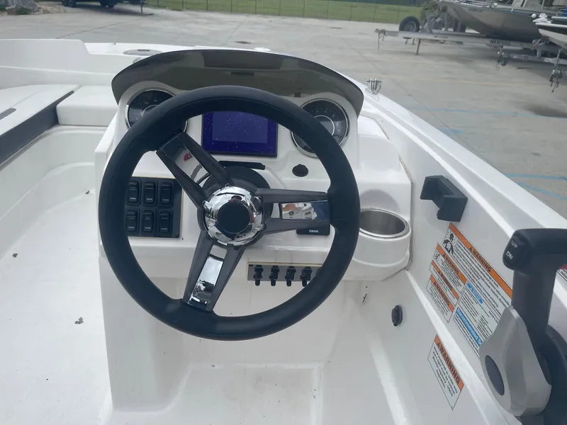 Slide: The Image of 2022 Hurricane SS185 OB boat dashboard with steering wheel and control panel. - 20
