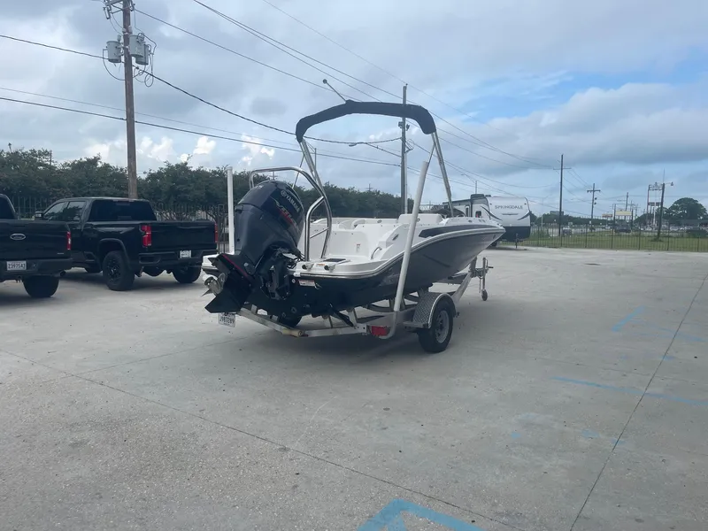 Slide: The Image of 2022 Hurricane SS185 OB boat on trailer in parking lot. - 3