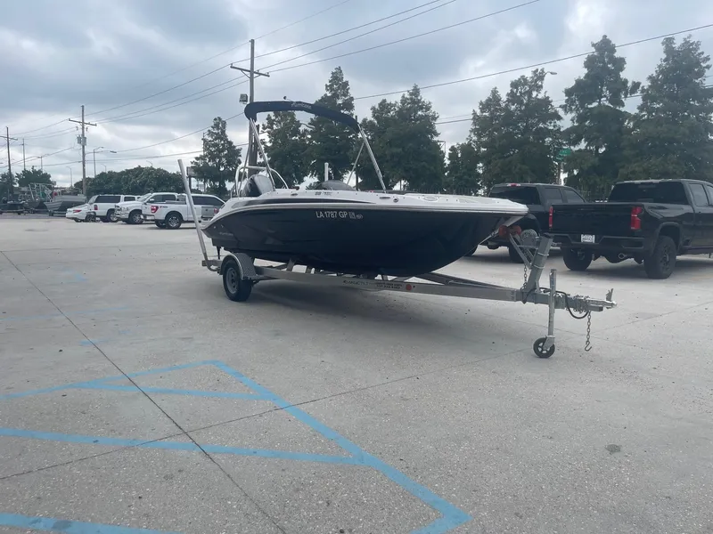 Slide: The Image of 2022 Hurricane SS185 OB boat on a trailer in a parking lot. - 5