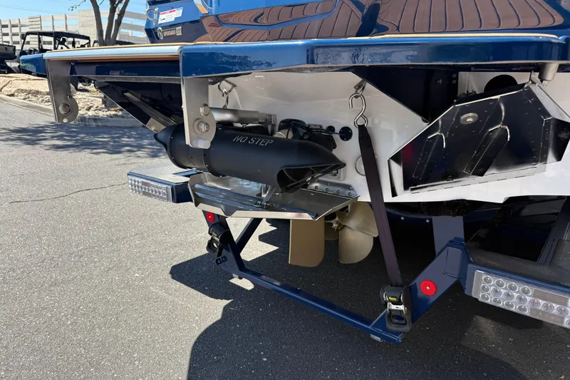 Slide: The Image of 2024 MasterCraft X24 boat stern with propeller and "No Step" warning. - 10