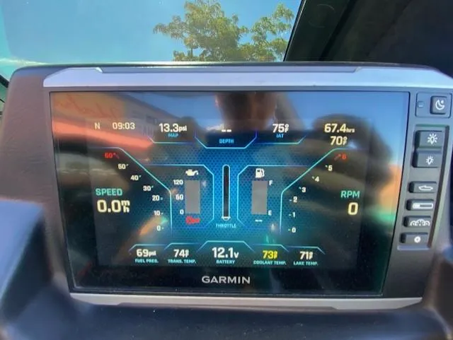 Slide: The Image of Garmin display in 2022 Axis Wake Research T250 boat showing engine metrics. - 20