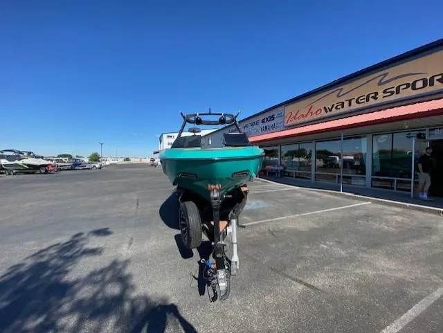 Slide: The Image of 2022 Axis Wake Research T250 boat on trailer at Idaho Water Sports dealership. - 8