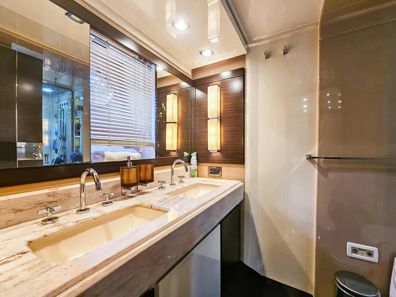 Slide: The Image of Luxurious bathroom in 2013 Azimut 70 yacht with double sinks and modern lighting. - 12
