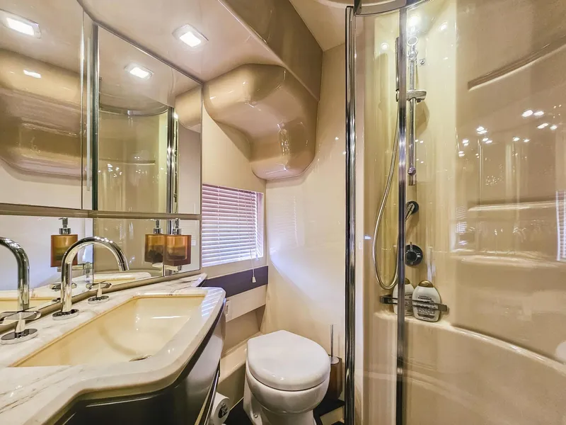 Slide: The Image of Luxurious bathroom in a 2013 Azimut 70 yacht with modern fixtures and shower. - 20