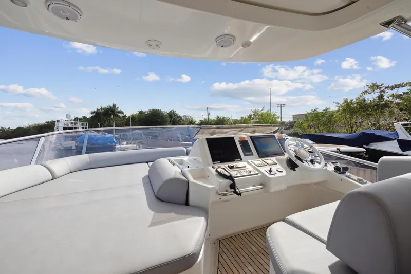 Slide: The Image of Flybridge of 2013 Azimut 70 yacht with helm station and seating area. - 36