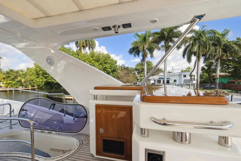 Slide: The Image of 2013 Azimut 70 yacht deck with tropical waterfront view. - 42
