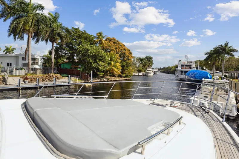 Slide: The Image of View from the deck of a 2013 Azimut 70 yacht in a scenic marina. - 49