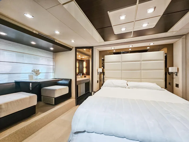 Slide: The Image of Luxurious bedroom interior of 2013 Azimut 70 yacht with modern decor and ambient lighting. - 6