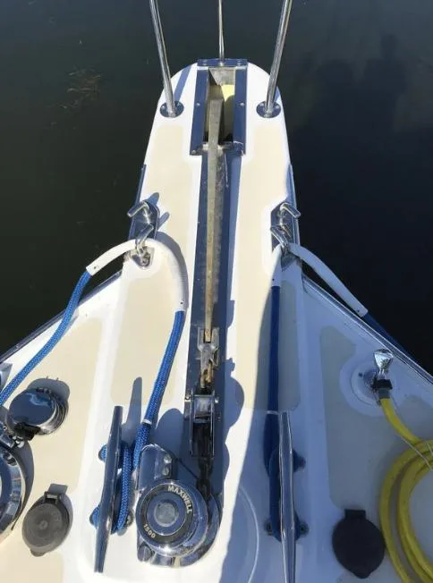 Slide: The Image of 2007 Duffy Aft Cabin boat deck with ropes and anchor equipment. - 12