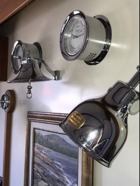 Slide: The Image of Chrome fixtures and nautical decor inside a 2007 Duffy Aft Cabin boat. - 20