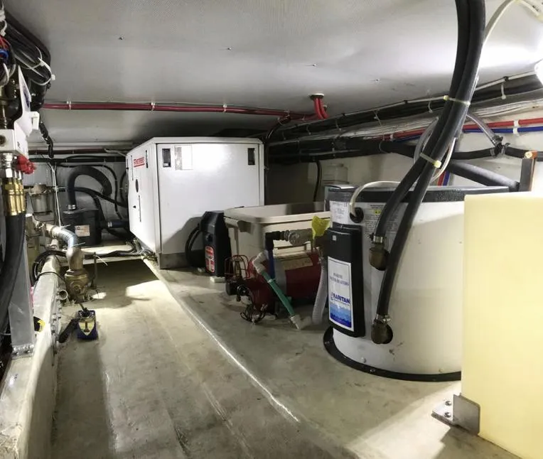 Slide: The Image of Engine room of 2007 Duffy Aft Cabin boat with equipment and wiring. - 31