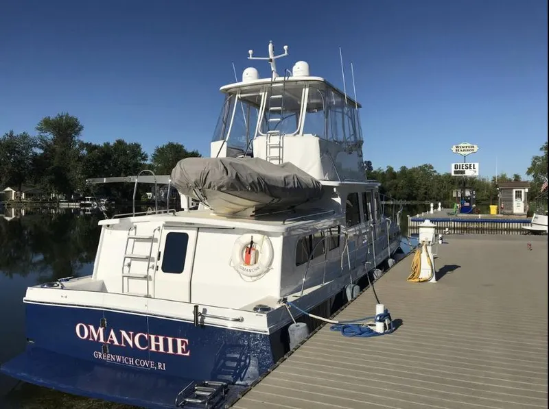 Slide: The Image of 2007 Duffy Aft Cabin yacht docked at marina, clear sky, calm water. - 37