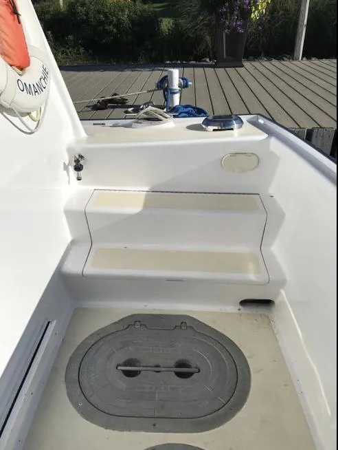 Slide: The Image of 2007 Duffy Aft Cabin boat interior with seating and deck details. - 4