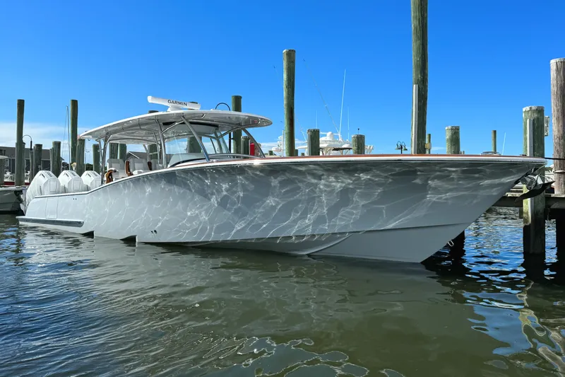 Slide: The Image of 2025 Mag Bay 43 CC boat docked in marina. - 17