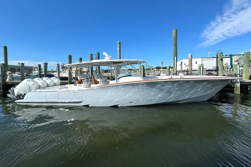 Slide: The Image of 2025 Mag Bay 43 CC boat docked in marina. - 19
