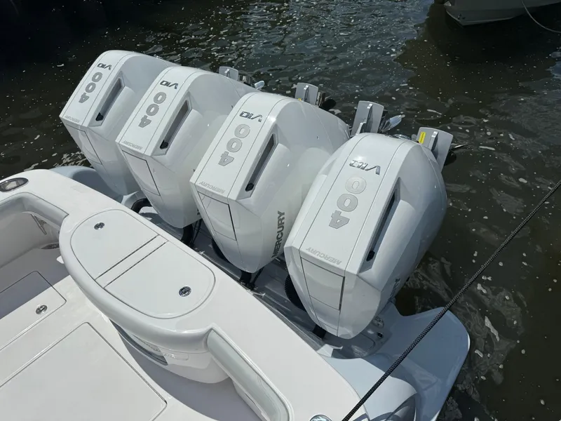 Slide: The Image of Quad outboard engines on a 2025 Mag Bay 43 CC boat. - 23