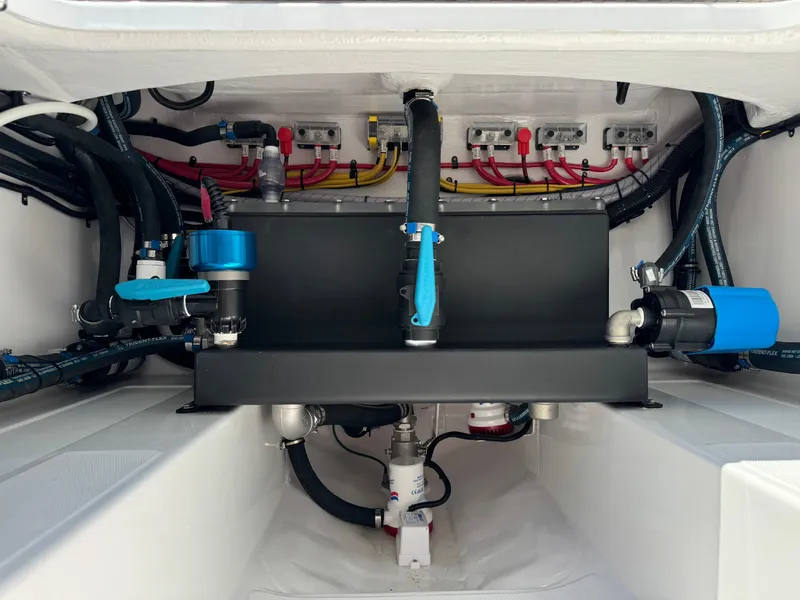 Slide: The Image of Engine compartment of 2025 Mag Bay 43 CC boat with wiring and plumbing. - 28