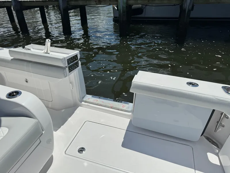 Slide: The Image of 2025 Mag Bay 43 CC boat interior, docked by the water. - 37