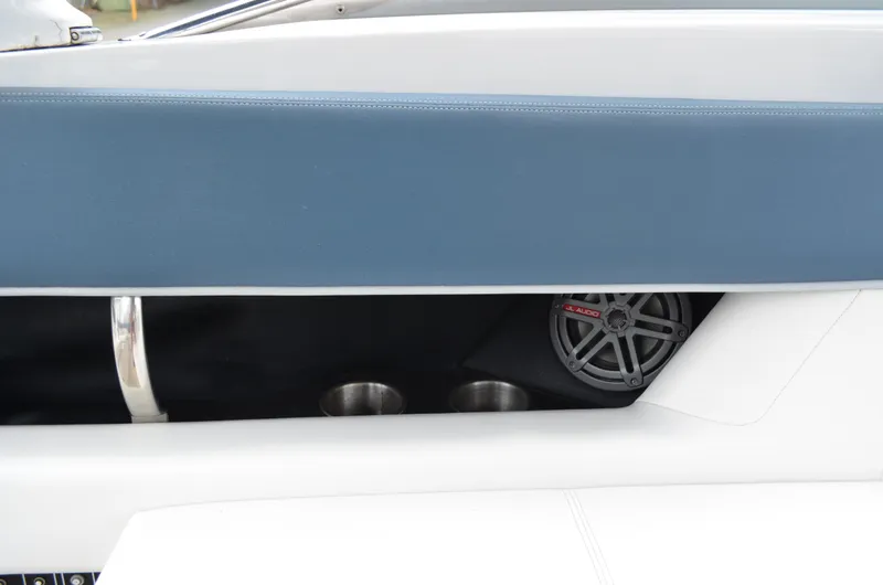 Slide: The Image of Interior of 2013 Four Winns H310 boat with JL Audio speaker and cup holders. - 29