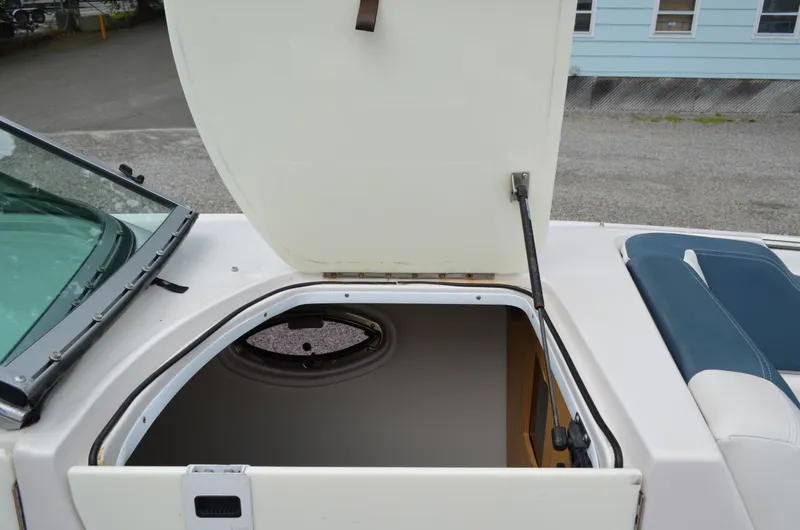 Slide: The Image of 2013 Four Winns H310 boat cabin entrance with open hatch. - 41