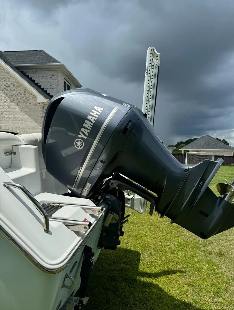 Slide: The Image of 2016 Sea Hunt Ultra 234 with Yamaha outboard motor. - 2