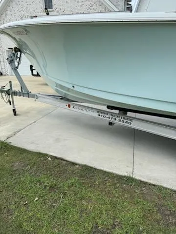 Slide: The Image of 2016 Sea Hunt Ultra 234 boat on trailer, side view. - 5