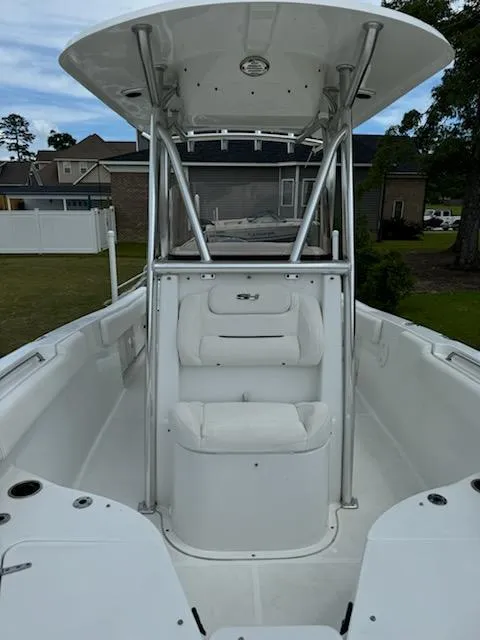 Slide: The Image of 2016 Sea Hunt Ultra 234 boat with center console and seating. - 8