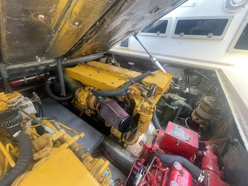 Slide: The Image of Engine compartment of a 1994 Albemarle 32 Express boat. - 14