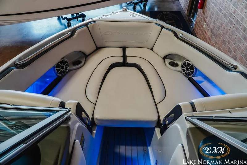 Slide: The Image of 2022 Crownline 220 SS SURF boat interior with blue LED lighting at Lake Norman Marina. - 12