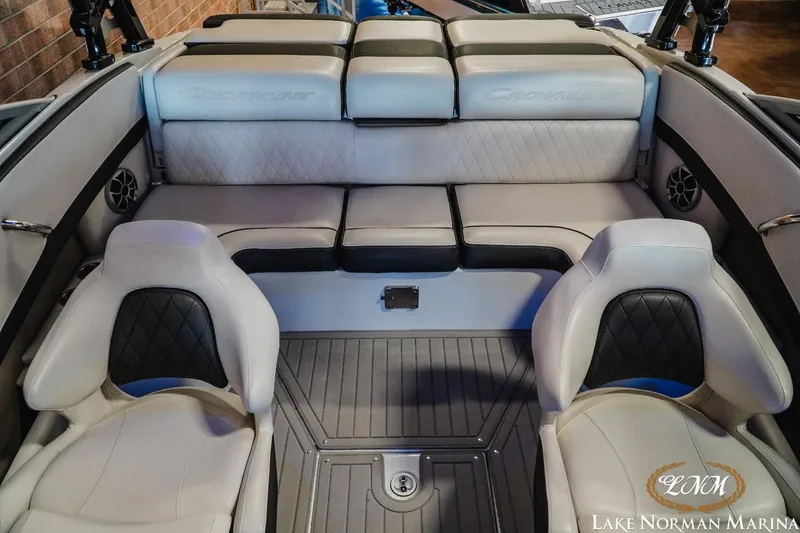 Slide: The Image of 2022 Crownline 220 SS SURF boat interior with luxurious seating at Lake Norman Marina. - 14