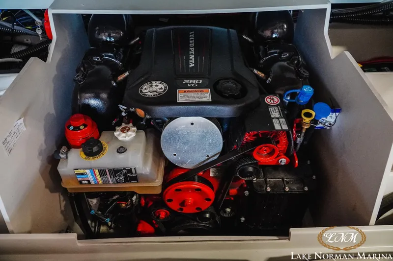 Slide: The Image of 2022 Crownline 220 SS SURF boat engine at Lake Norman Marina. - 18