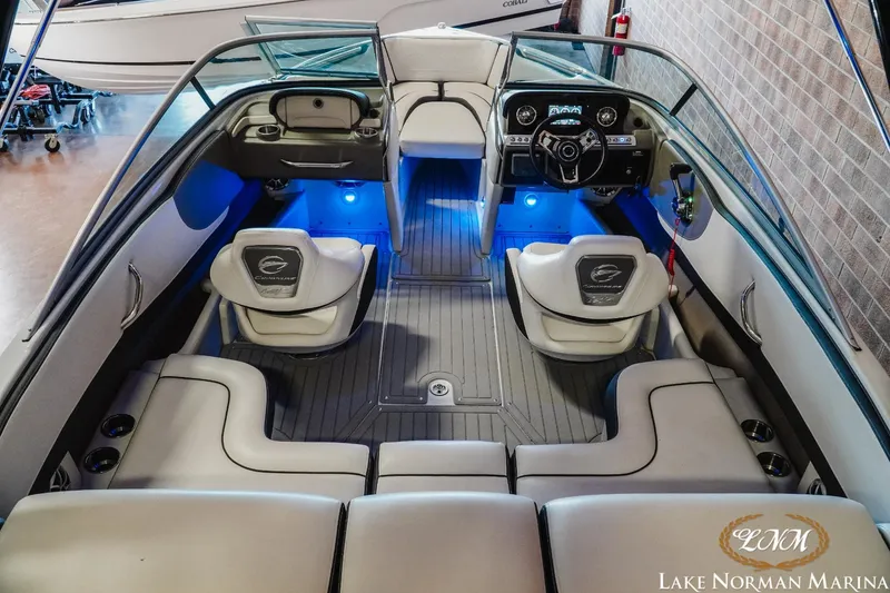 Slide: The Image of 2022 Crownline 220 SS SURF boat interior with blue LED lighting at Lake Norman Marina. - 8